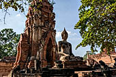 Ayutthaya, Thailand. Wat Mahathat, a small vihara with a chedi and a Buddha image near the eastern side of the eclosure 